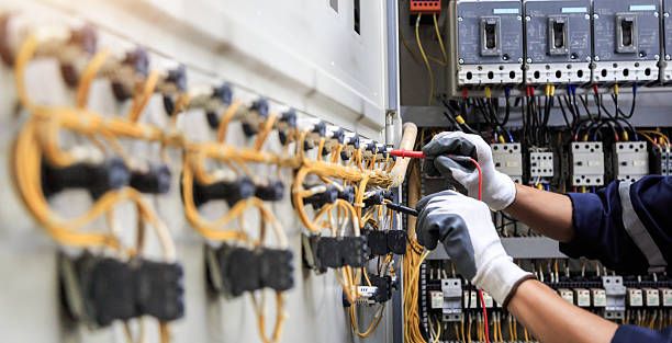 Professional Electrician technician working in La Harpe, IL